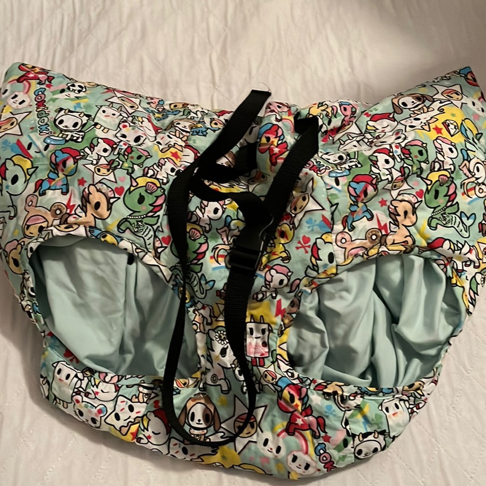 Tokidoki x Bebe Au Lait shopping cart cover in Unicorno 2.0